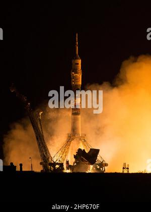 The Soyuz TMA-14M rocket launches from the Baikonur Cosmodrome in Kazakhstan on Friday, Sept. 26, 2014 carrying Expedition 41 Soyuz Commander Alexander Samokutyaev of the Russian Federal Space Agency (Roscosmos), Flight Engineer Barry Wilmore of NASA, and Flight Engineer Elena Serova of Roscosmos into orbit to begin their five and a half month mission on the International Space Station. Stock Photo