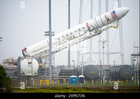 The Orbital Sciences Corporation Antares rocket, with the Cygnus spacecraft onboard, is raised at launch Pad-0A, Thursday, July 10, 2014, at NASA's Wallops Flight Facility in Virginia.