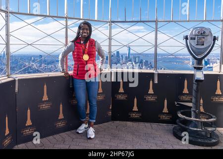 New York, New York, USA. 18th Feb, 2022. ERIN JACKSON, 2022 Beijing Olympics speed skating gold medalist visits The Empire State Building and observatory in New York. Erin became the first ever Black woman to win Team USA a gold medal in speed skating for the women's 500 meter speed skating race. (Credit Image: © Lev Radin/ZUMA Press Wire) Credit: ZUMA Press, Inc./Alamy Live News Stock Photo