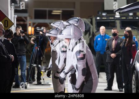 From left to right, ESA (European Space Agency) astronaut Thomas Pesquet, Japan Aerospace Exploration Agency (JAXA) astronaut Akihiko Hoshide, and NASA astronauts Shane Kimbrough and Megan McArthur, are seen as they prepare to depart the Neil  A. Armstrong Operations and Checkout Building for Launch Complex 39A to board the SpaceX Crew Dragon spacecraft for the Crew-2 mission launch, Friday, April 23, 2021, at NASA’s Kennedy Space Center in Florida. Stock Photo