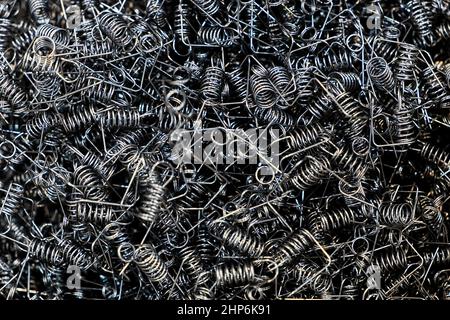 Close-up industrial springs coil group on top-view, little springs coil for use with mechanical device on factory and other Stock Photo