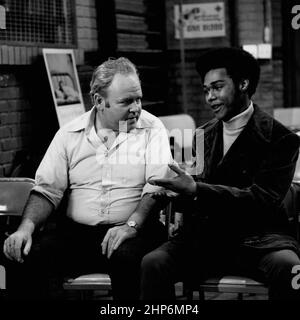 Publicity photo from the television program All in the Family.  Pictured are Carroll O'Connor and Michael Evans ca. 1971 Stock Photo