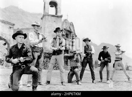 Publicity photo of the cast of 1960 western The Magnificent Seven. From left to right: Yul Brynner, Steve McQueen, Horst Buchholz, Charles Bronson, Robert Vaughn, Brad Dexter, and James Coburn Stock Photo