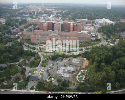 The aerial photograph shows the Clinical Center in the center of the photograph. The Clinical Center opened its doors in 1953 and has grown in size over the decades. ca.  2014 Stock Photo