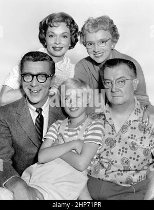 Publicity photo of the cast of the CBS comedy television series Dennis the Menace, (Clockwise from center) Jay North, Herbert Anderson, Gloria Henry, Sylvia Field and Joseph Kearns Stock Photo