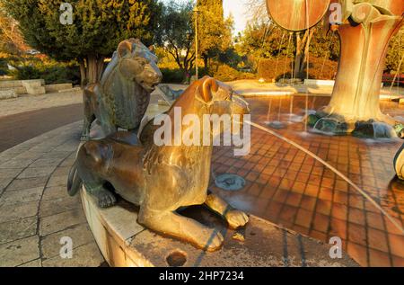 Historical lion statue at the fountain near the cathedral in Cologne  Stock Photo