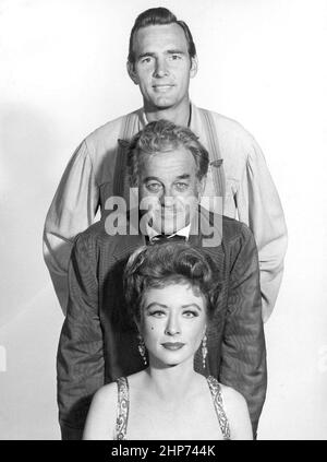 Photo of the supporting cast of Gunsmoke in 1960.  From top-Dennis Weaver (Chester Goode), Milburn Stone (Doc Adams) and Amanda Blake (Miss Kitty Russell) Stock Photo