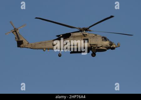 A US Navy Sikorsky SH-60 Seahawk helicopter flying near Naval Air Facility, Atsugi airbase,  Kanagawa, Japan Stock Photo