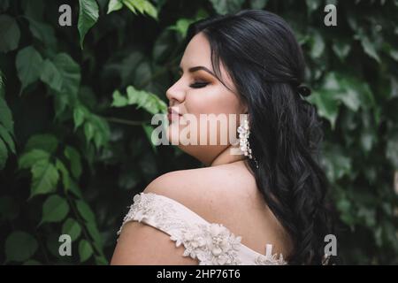 Chubby teen girl ready for her prom. Looking very confident Stock Photo