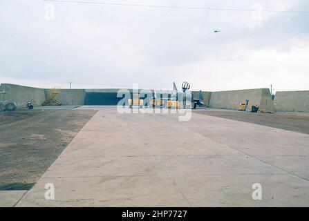 A soil cement revetment on the south end of the DaNang airfield. These revetments were 12 feet high, approximately 4 feet across the top, and 8 feet across the bottom - PD Photo Courtesy of USMC Stock Photo