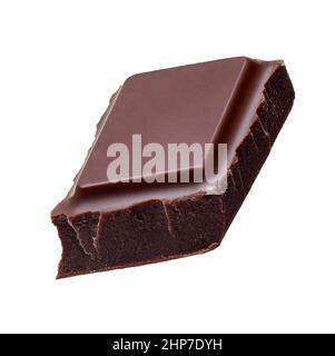 close up of chocolate pieces stack falling on white background Stock Photo