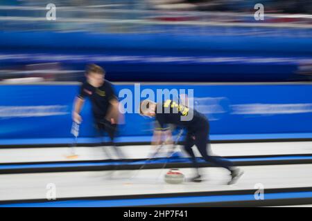 Beijing, China. 19th Feb, 2022. Sweden's Rasmus Wranaa sweeps during the Men's Curling Gold Medal match against Great Britain at the Beijing 2022 Winter Olympics on Saturday, February 19, 2022. Photo by Paul Hanna/UPI Credit: UPI/Alamy Live News Stock Photo