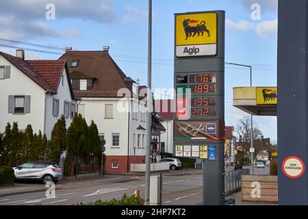Kirchheim, Germany - February 19, 2022: Price board of high expensive gasoline and fuel prices in the city. Agip. Stock Photo