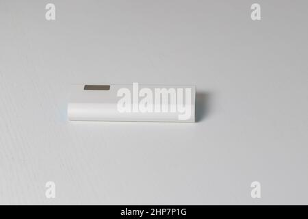 White power bank box on white table. Stock Photo