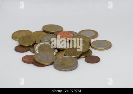 Various metal EURO coins on a stack on a white background Stock Photo
