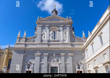 East Entrance of Almudena Cathedral - A sunny Autumn day view of the façade of east entrance of Almudena Cathedral, Madrid, Spain. Stock Photo