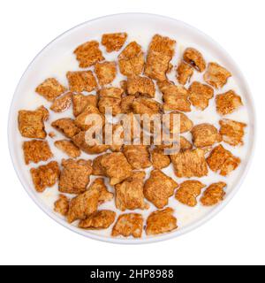 Crispy pads chocolate flakes in milk isolated on the white background Stock Photo