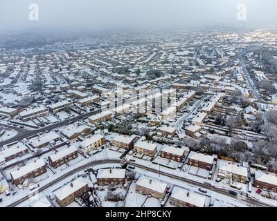 Aerial view of snow covered Buttershaw council estate, Bradford, West Yorkshire, UK. 19th Feb 2022. Stock Photo