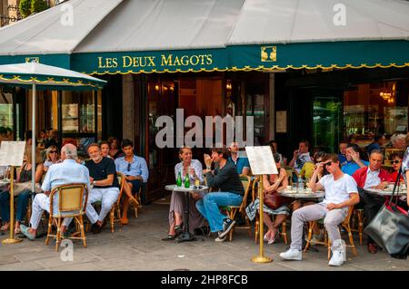 Paris, France, Crowd People Sharing Drinks on Terrace paris cafe, in Latin Quarter, 'Les Deux Magots' Street Scene Stock Photo