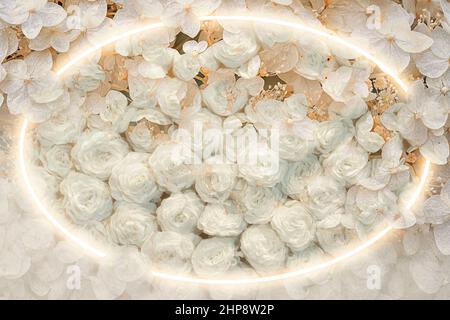 Ellipse lighten frame on a white flowers. Stock Photo