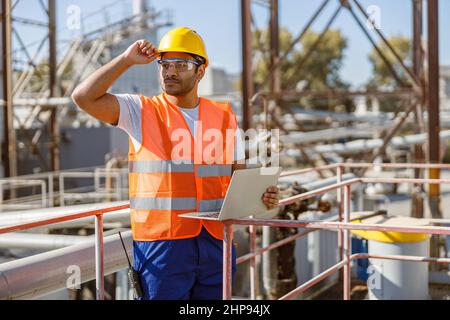 Experienced worker concentrating at his work in plant Stock Photo