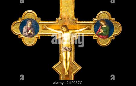 Antique crucifix made of gold - Roman Catholic Church, Jesus Christ Stock Photo