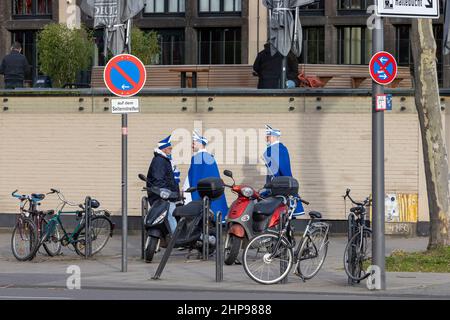 Men dressed in ancient German uniforms during carnival season in Cologne. Stock Photo