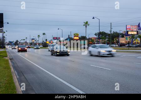 Kissimmee, Florida - February 6, 2022: Wide Angle View of Irlo Bronson Memorial Hwy on a Cloudy Day with Medium Traffic. Stock Photo