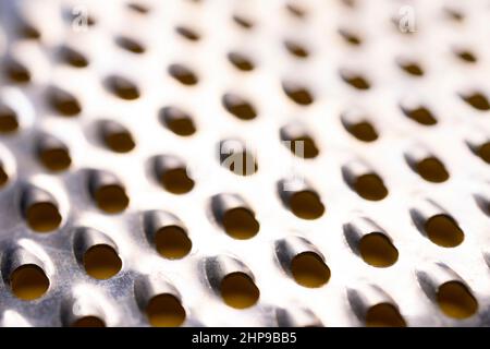 detail of a utensil for grating in the kitchen Stock Photo