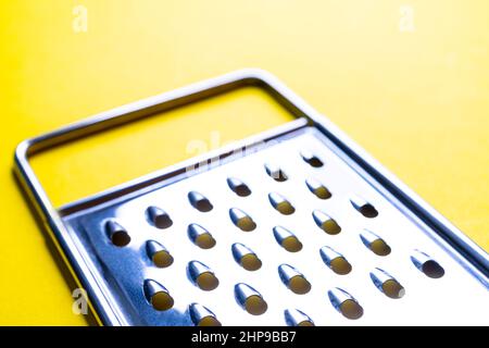 detail of a utensil for grating in the kitchen Stock Photo