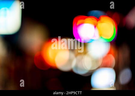 Tokyo, Japan Shinjuku downtown city district ward at night with abstract blurry blurred bokeh background of lights on street urban nightlife shallow d Stock Photo