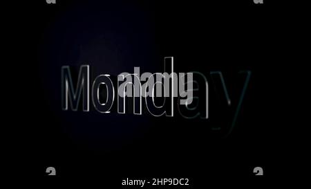 Monday text word gliding on black, glossy background, 3D animation. Silver, 3D text animation of word monday. Stock Photo