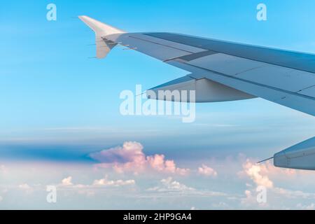 Airplane flying pov from window high angle view near Ft Myers with Saharan dust plume air layer causing haze pollution and allergies in southwest Flor Stock Photo