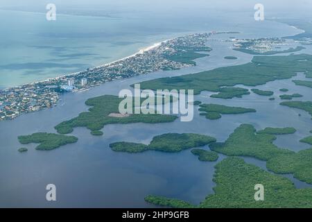 Aerial plane or drone view of Ft Myers beach landscape near Sanibel Island in southwest in Florida Saharan with beautiful green water and Estero Bay A Stock Photo