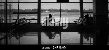 International airport with people in the hall indoor black white photo Stock Photo