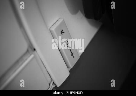 Inscription exit inside the plane in black and white color Stock Photo