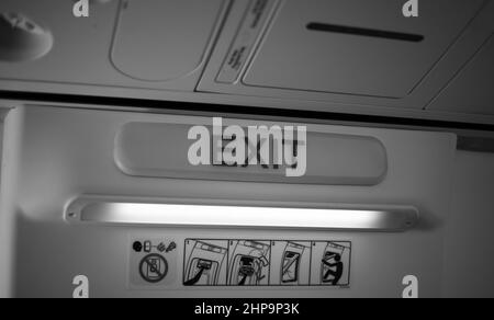 Inscription exit inside the cockpit in black and white Stock Photo