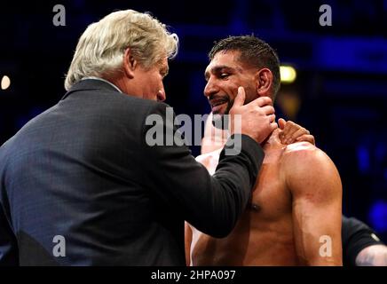 Amir Khan (right) speaks to BBBofC steward Robert W. Smith after losing the Welterweight Contest fight against Kell Brook at the AO Arena, Manchester. Picture date: Saturday February 19, 2022. Stock Photo