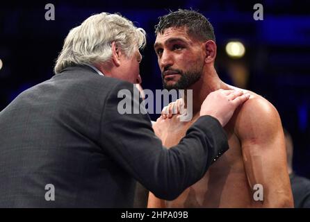 Amir Khan (right) speaks to BBBofC steward Robert W. Smith after losing the Welterweight Contest fight against Kell Brook at the AO Arena, Manchester. Picture date: Saturday February 19, 2022. Stock Photo