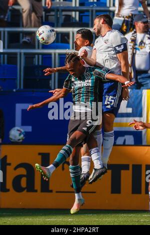 Los Angeles, California, USA. 19th Feb, 2022. LA Galaxy forward Kevin Cabral (9) battles for the head ball against D.C. United defender Staven Birnbaum (15) and midfielder Edison Flores (10) during the 2022 Major League Soccer (MLS) preseason match between the D.C. United and the LA Galaxy in Carson, Calif., Feb. 19, 2022. (Credit Image: © Ringo Chiu/ZUMA Press Wire) Stock Photo