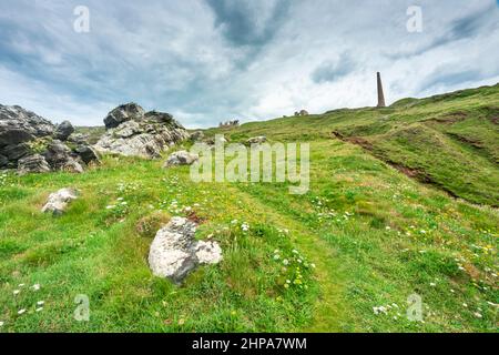 UNESCO World Heritage Site,part of a group of disused mines in the area,on a calm summer day.On the dramatic north Cornish coast,a popular holiday,tou Stock Photo