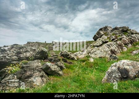 UNESCO World Heritage Site,part of a group of disused mines in the area,on a calm summer day.On the dramatic north Cornish coast,a popular holiday,tou Stock Photo