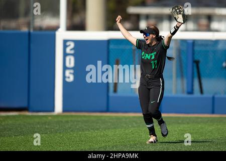 North Texas Mean Green outfielder Molly Rainey (11) celebrates after a teammate makes a diving catch against Tulsa during the McNeese State Softball T Stock Photo