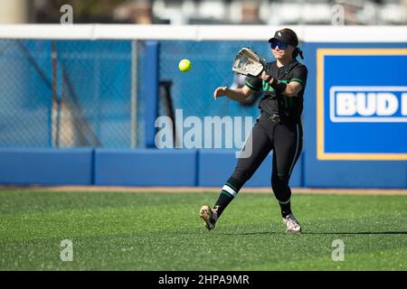 North Texas Mean Green outfielder Molly Rainey (11) fields a ball against Tulsa during the McNeese State Softball Tournament, Friday, Feb. 11, 2022, i Stock Photo