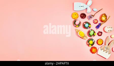 Coloeful easter eggs in nest on pastel color background with space ...