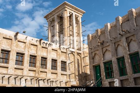 Tower in Souq Waqif with traditional middle eastern qatari architecture Stock Photo