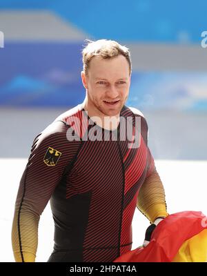 Beijing, China. 20th Feb, 2022. Francesco Friedrich of Germany reacts after the bobsleigh 4-man heat of Beijing 2022 Winter Olympics at National Sliding Centre in Yanqing District, Beijing, capital of China, Feb. 20, 2022. Credit: Yao Jianfeng/Xinhua/Alamy Live News Stock Photo