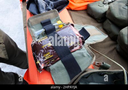 First-aid kit for soldiers placed on a table during military training Stock Photo
