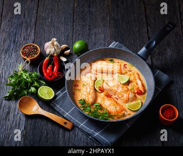 Poached Salmon In Coconut Lime Sauce, Salmon Fish Curry In A Blue 