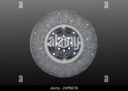 Clutch disc, car clutch disc, car transmission, on black background, close-up selective focus Stock Photo